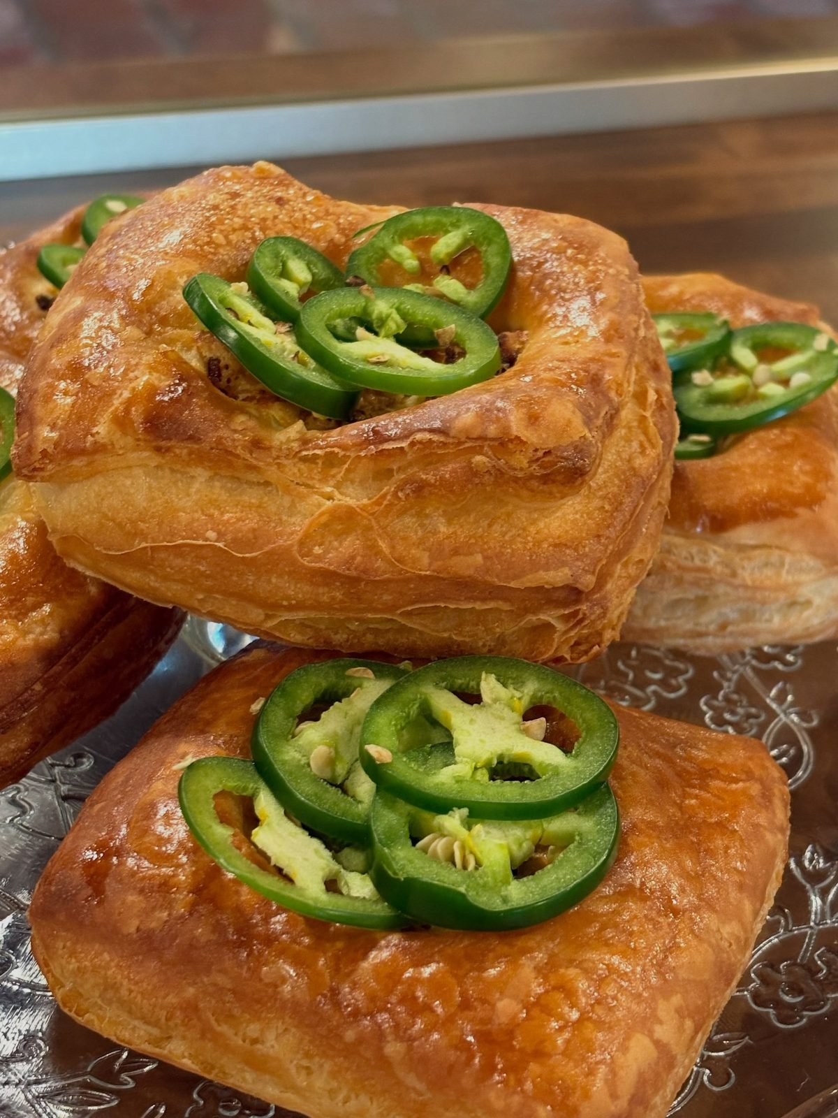 Puff pastry topped with jalapeño slices